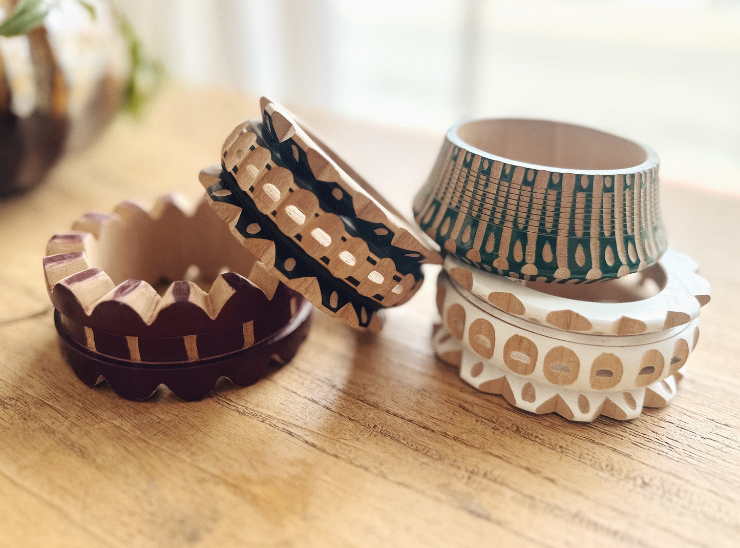 Hand-carved wooden bangles by Carla Fernandez