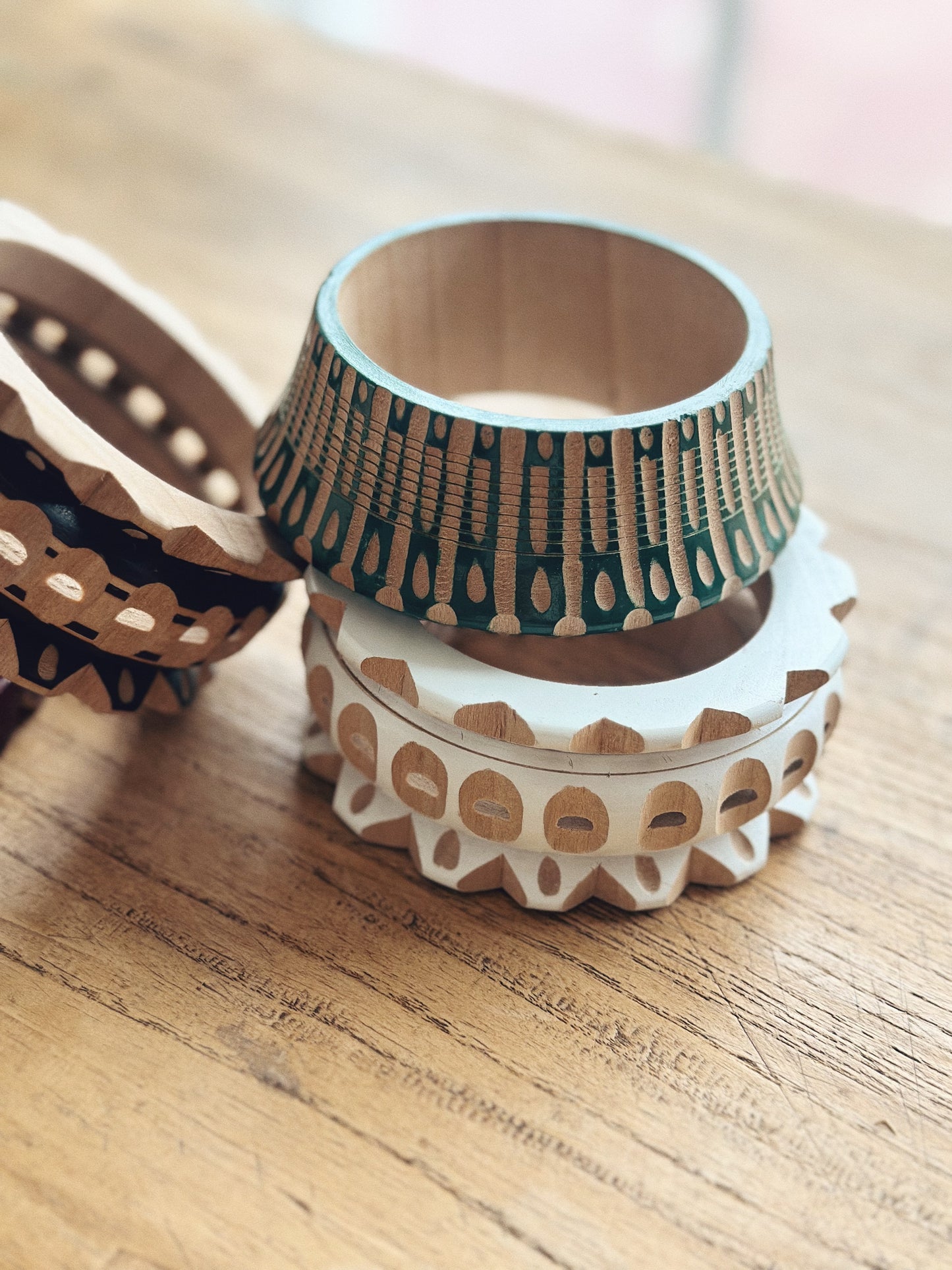Hand-carved wooden bangles by Carla Fernandez